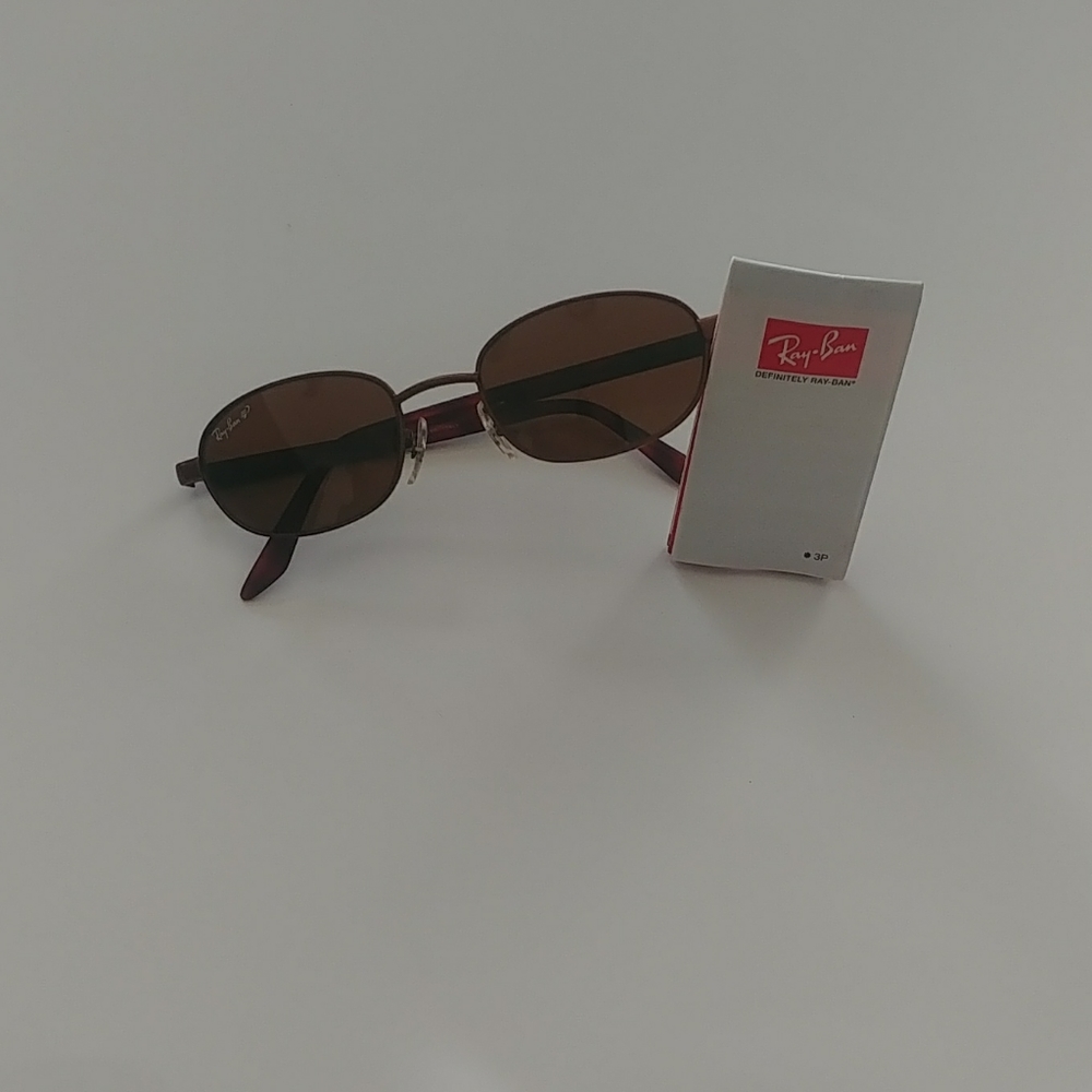 A pair of brand new  RAYBAN sunglasses